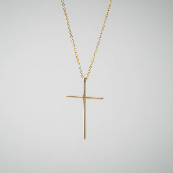 Modern gold store cross necklace